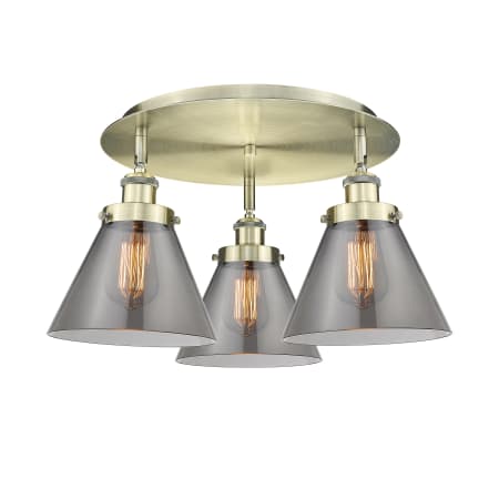 A large image of the Innovations Lighting 916-3C-10-20 Cone Flush Antique Brass / Plated Smoke