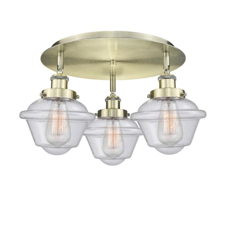 A large image of the Innovations Lighting 916-3C-8-19 Oxford Flush Antique Brass / Seedy