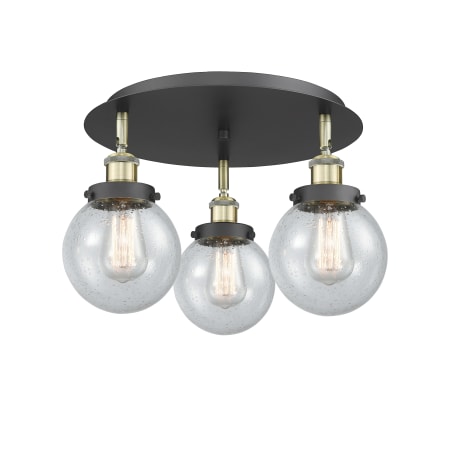 A large image of the Innovations Lighting 916-3C-10-18 Beacon Flush Black Antique Brass / Seedy