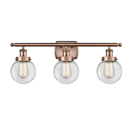 A large image of the Innovations Lighting 916-3W-11-26 Beacon Vanity Antique Copper / Clear