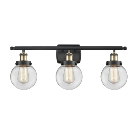 A large image of the Innovations Lighting 916-3W-11-26 Beacon Vanity Black Antique Brass / Clear