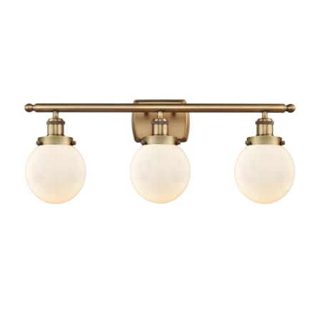 A large image of the Innovations Lighting 916-3W-11-26 Beacon Vanity Brushed Brass / Matte White
