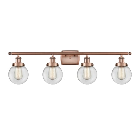 A large image of the Innovations Lighting 916-4W-11-36 Beacon Vanity Antique Copper / Clear