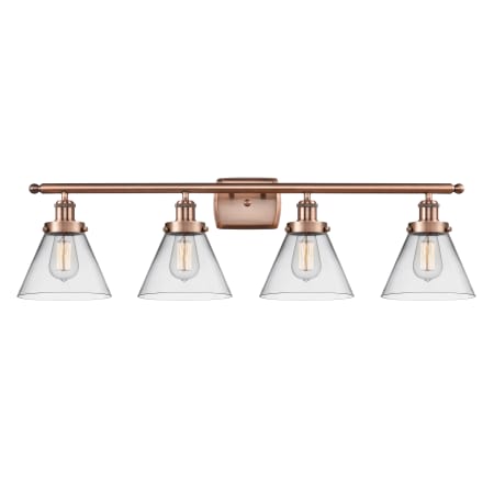 A large image of the Innovations Lighting 916-4W-11-38 Cone Vanity Antique Copper / Clear