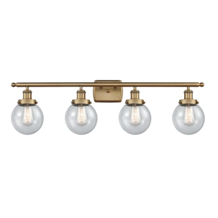 A large image of the Innovations Lighting 916-4W-11-36 Beacon Vanity Brushed Brass / Seedy