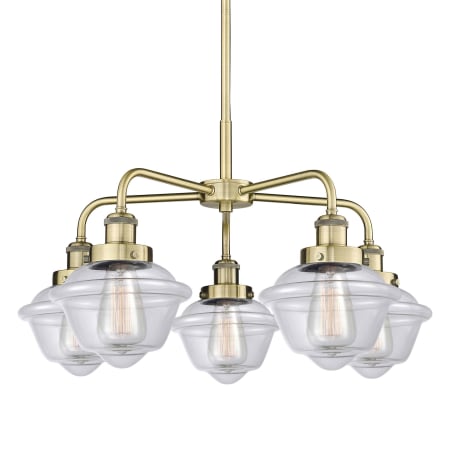 A large image of the Innovations Lighting 916-5CR-14-25 Oxford Chandelier Antique Brass / Clear