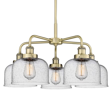 A large image of the Innovations Lighting 916-5CR-15-26 Bell Chandelier Antique Brass / Seedy