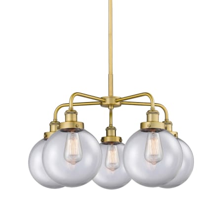 A large image of the Innovations Lighting 916-5CR-18-26 Beacon Chandelier Brushed Brass / Clear