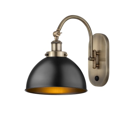A large image of the Innovations Lighting 918-1W-11-10 Ballston Urban Sconce Antique Brass / Matte Black