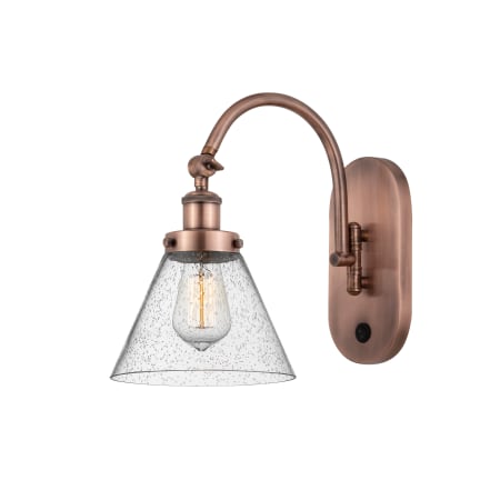 A large image of the Innovations Lighting 918-1W-13-8 Cone Sconce Antique Copper / Seedy