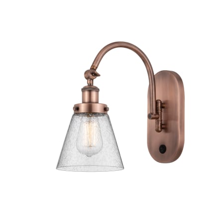 A large image of the Innovations Lighting 918-1W-13-7 Cone Sconce Antique Copper / Seedy