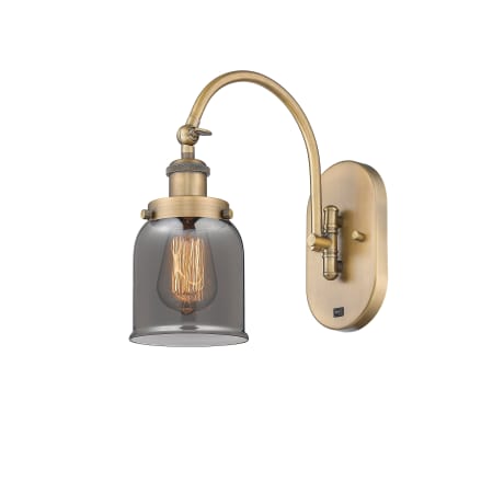 A large image of the Innovations Lighting 918-1W-13-5 Bell Sconce Brushed Brass / Plated Smoke
