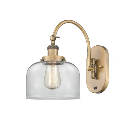 A large image of the Innovations Lighting 918-1W-13-8 Bell Sconce Brushed Brass / Clear