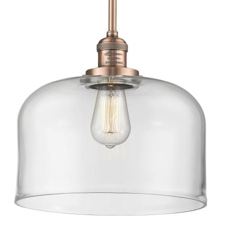 A large image of the Innovations Lighting 201S X-Large Bell Antique Copper / Clear