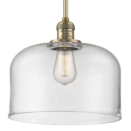 A large image of the Innovations Lighting 201S X-Large Bell Brushed Brass / Clear