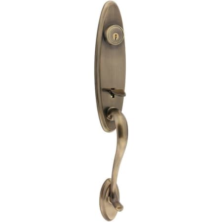 A large image of the Kwikset 800WN-LIP Antique Brass