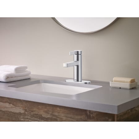 A large image of the Moen 84774 Beric Single Hole Faucet Installed with Escutcheon