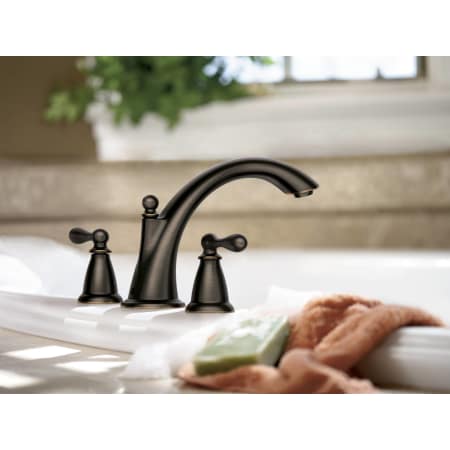 A large image of the Moen 86440 Moen-86440-Installed Roman Tub Faucet in Mediterranean Bronze