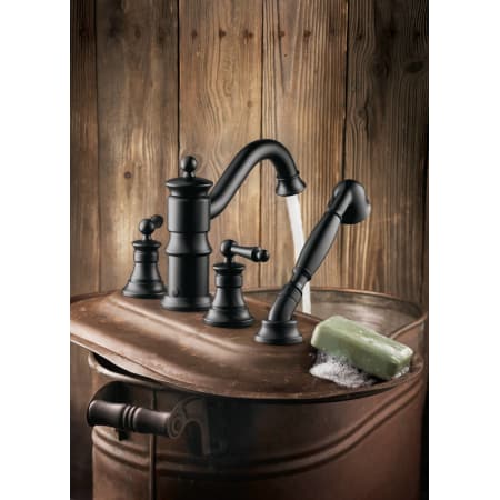 A large image of the Moen TS213 Moen-TS213-Running Roman Tub Faucet in Wrought Iron