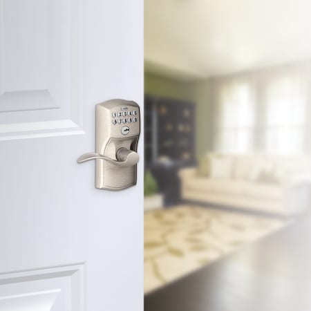 A large image of the Schlage FE595-CAM-ACC Schlage's FE595-CAM-ACC in Satin Nickel on door.