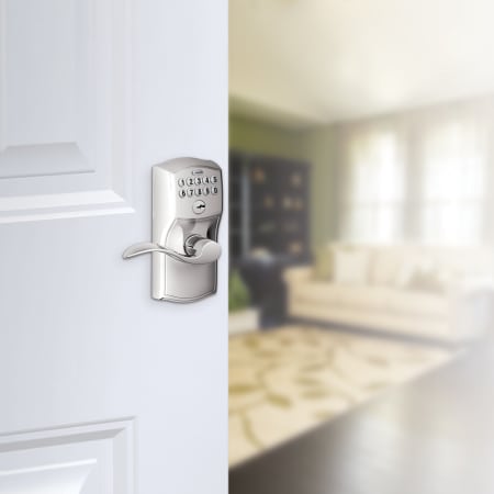 A large image of the Schlage FE595-CAM-ACC Schlage's FE595-CAM-ACC in Polished Chrome on door.