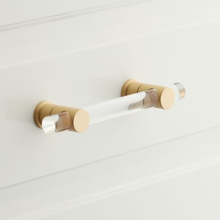 A large image of the Signature Hardware 953805-5.0625 Clear / Satin Brass