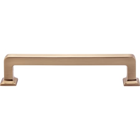 A large image of the Top Knobs TK704 Honey Bronze