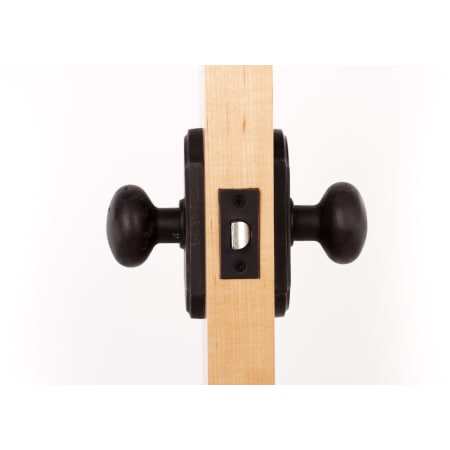 A large image of the Weslock 7100F Wexford Series 7100F Passage Knob Set Door Edge View