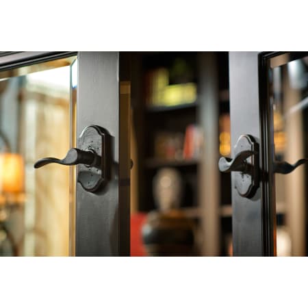 A large image of the Weslock 7140H-LH Carlow Lever with Premier Rosette in Oil Rubbed Bronze