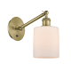 A thumbnail of the Innovations Lighting 317-1W-13-6 Cobbleskill Sconce Antique Brass / Matte White