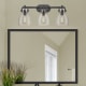 A thumbnail of the Innovations Lighting 410-3W-12-27 Newton Bell Vanity Alternate Image