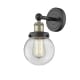 A thumbnail of the Innovations Lighting 616-1W-10-7 Beacon Sconce Black Antique Brass / Clear