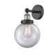 A thumbnail of the Innovations Lighting 616-1W-10-7-L Beacon Sconce Black Antique Brass / Clear