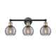 A thumbnail of the Innovations Lighting 616-3W 10 24 Athens Deco Swirl Vanity Black Antique Brass / Light Smoke Deco Swirl