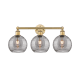 A thumbnail of the Innovations Lighting 616-3W 12 26 Athens Deco Swirl Vanity Brushed Brass / Light Smoke Deco Swirl