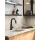 A thumbnail of the Moen S55005 Matte Black Faucet with Brushed Gold Handle