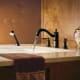 A thumbnail of the Moen TS213 Moen-TS213-Installed Roman Tub Faucet in Wrought Iron