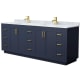 A thumbnail of the Wyndham Collection WCF2929-84D-NAT-MXX Dark Blue / White Carrara Marble Top / Brushed Gold Hardware