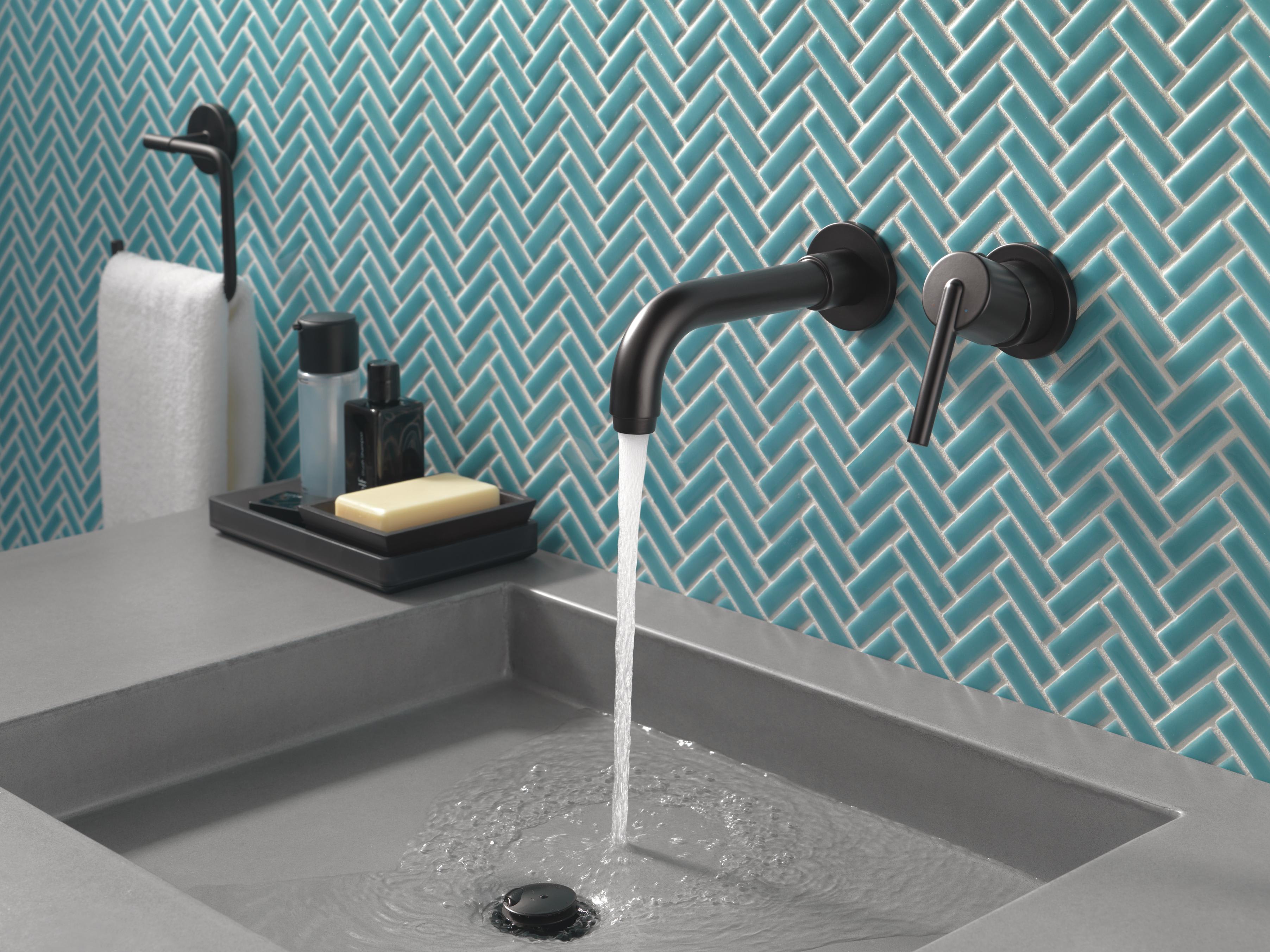 Delta T3559LF-CZWL Champagne Bronze Trinsic 1.2 GPM Wall Mounted Bathroom  Faucet Less Drain Assembly and Rough-In Valve - Faucet.com