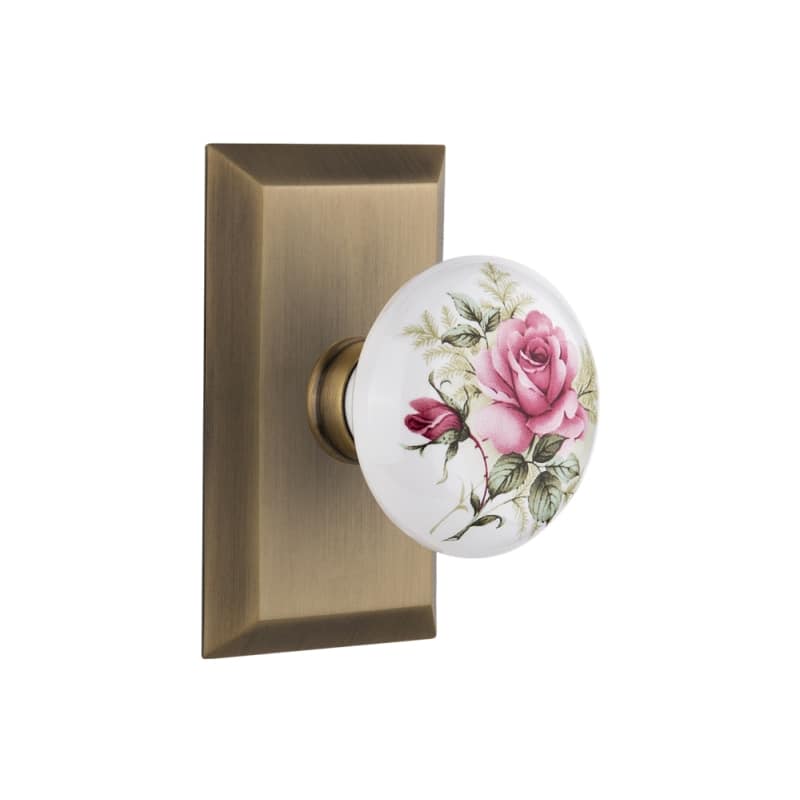 Nostalgic Warehouse Rose Porcelain Solid Brass Privacy Knobset with Studio Rose - Antique Brass - 717819