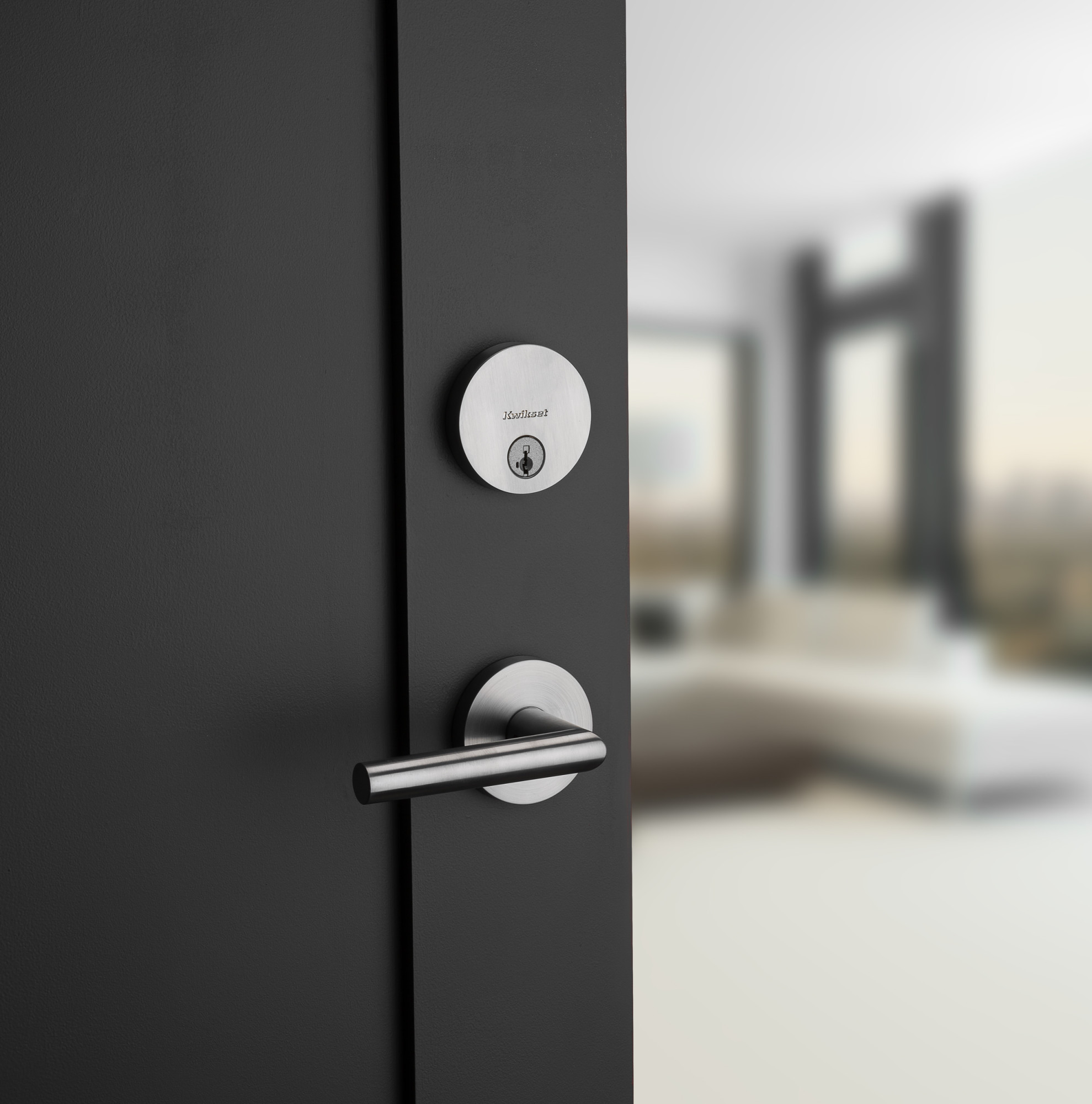 Kwikset 154mil Black Iron Milan Passage Door Lever Set With Round