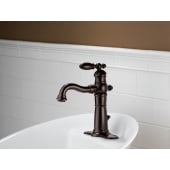 Delta-555LF-Installed Faucet with Escutcheon Plate in Venetian Bronze