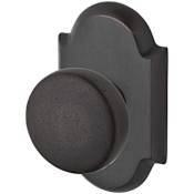 Baldwin Rustic Non-Turning Two-Sided Through-Door Dummy Door Knob Set with Arch Rosette from the Reserve Collection Dark Bronze