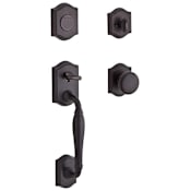 Baldwin Westcliff Dummy Handleset with Traditional Arch Rose and Round Knob on Interior Venetian Bronze
