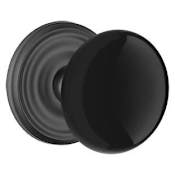 Emtek Ebony Porcelain Privacy Door Knobset with Brass Rosette and the Concealed Screws Flat Black