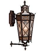 Fine Art Handcrafted Lighting Chateau Outdoor Four-Light Outdoor Wall Sconce with Gold Accents and Antiqued Glass Variegated Rich Umber Patina