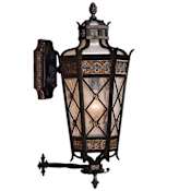 Fine Art Handcrafted Lighting Chateau Outdoor Single-Light Outdoor Wall Sconce with Gold Accents and Antiqued Glass Variegated Rich Umber Patina