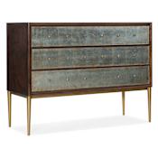 Hooker Furniture Melange 48" Wide 3 Drawer Glass, Mahogany, and Metal Accent Cabinet Dark Wood / Silver