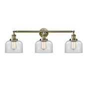 Innovations Lighting Bell 3 Light 32" Wide Commercial Vanity Light Antique Brass / Clear