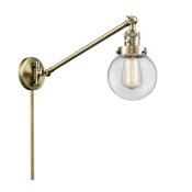 Innovations Lighting Beacon 25" Tall Hardwired or Plug-In Wall Sconce / Converts to Pendant Antique Brass / Clear